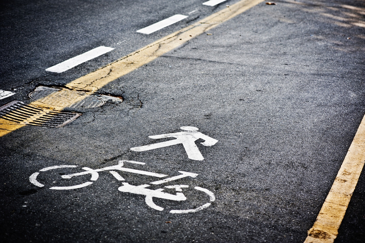 Road with Pedestrian and Bicycle Signal Printed on the Ground