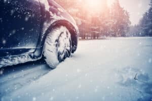 Car driving on snow-packed road in St. Louis