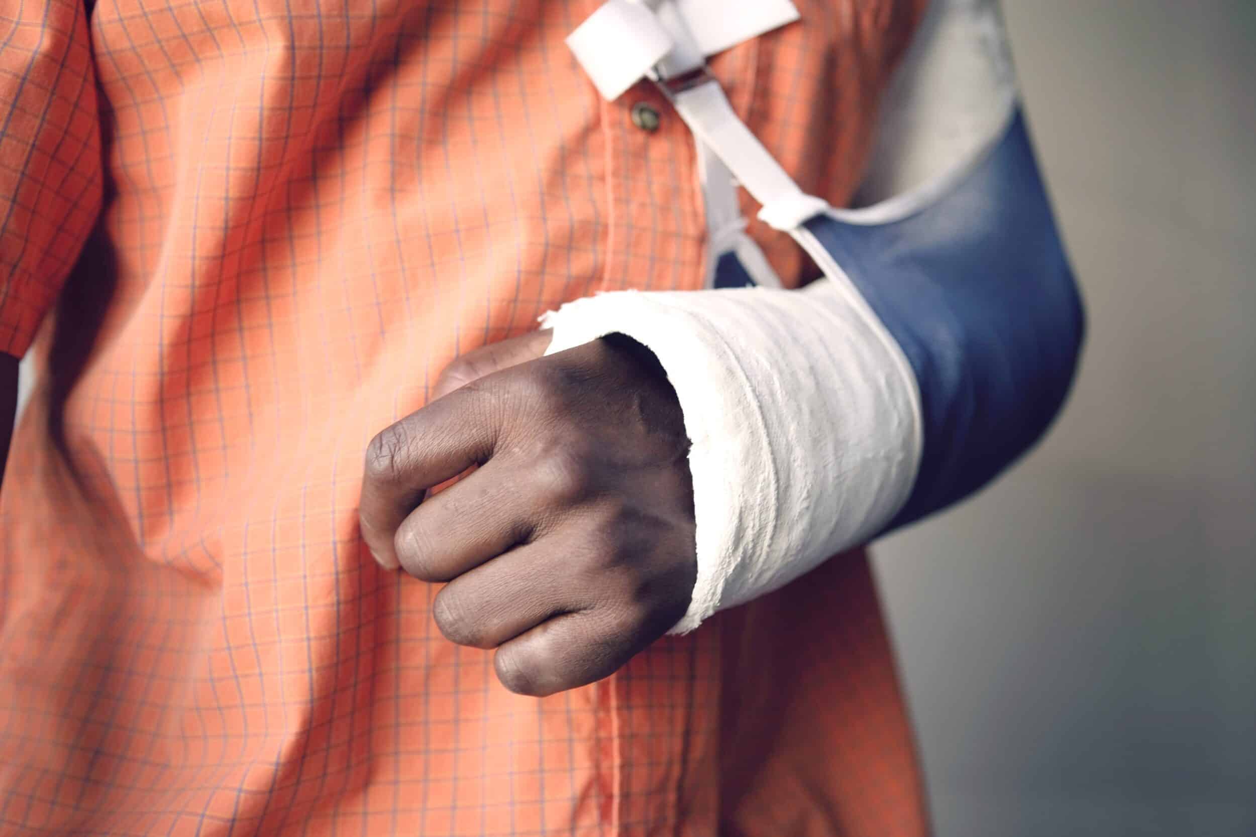 A man’s arm in a sling