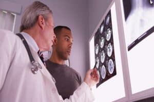 A doctor talking to a patient about a TBI