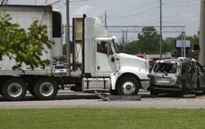 A truck and car after a truck accident in St. Louis, MO