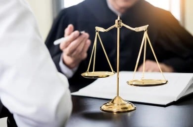 A mass tort attorney talking to a client