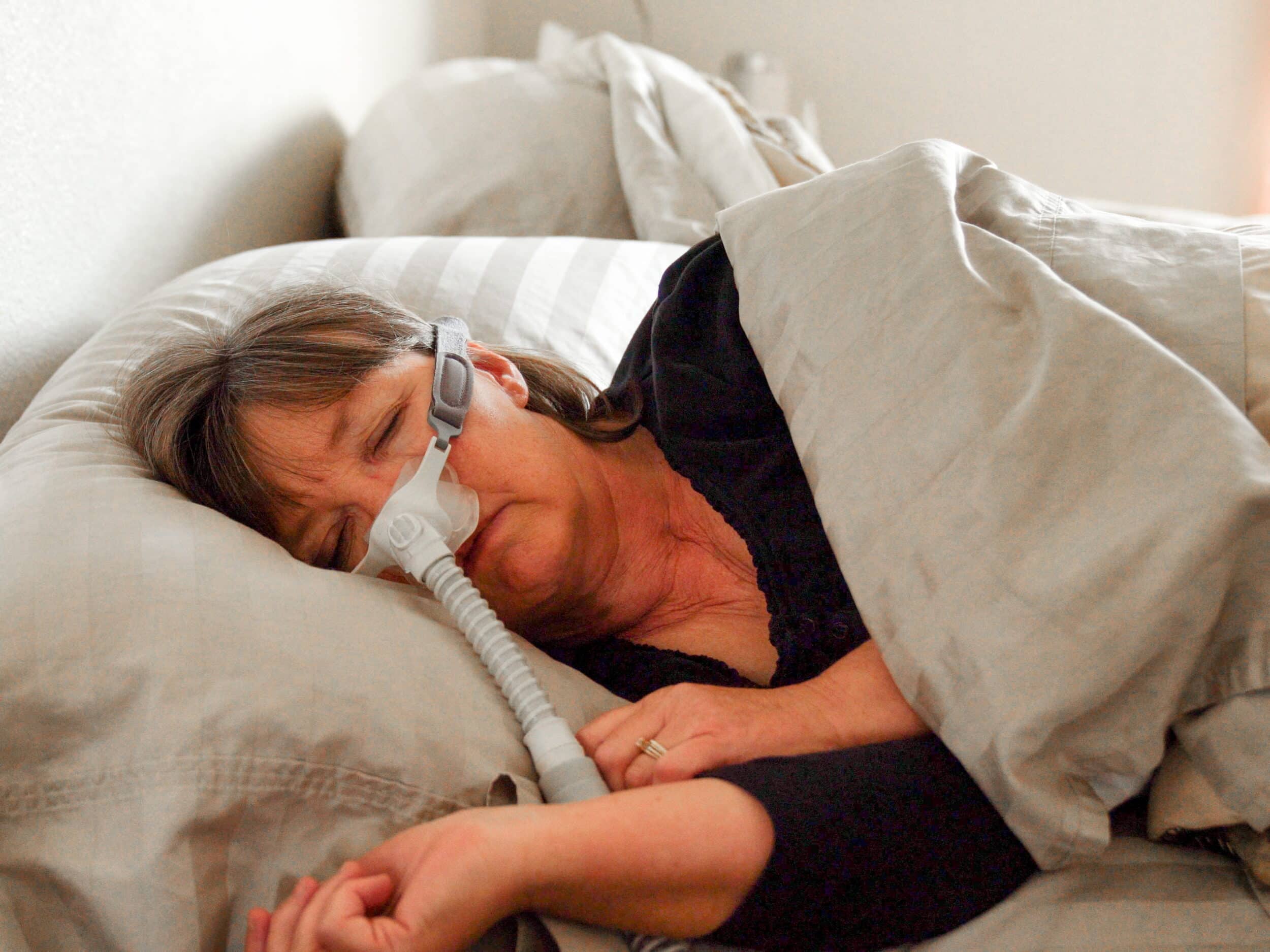 Woman waking up with chest pain